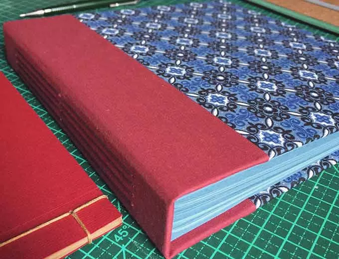 caderno livro capa dura encadernação artesanal longstitch